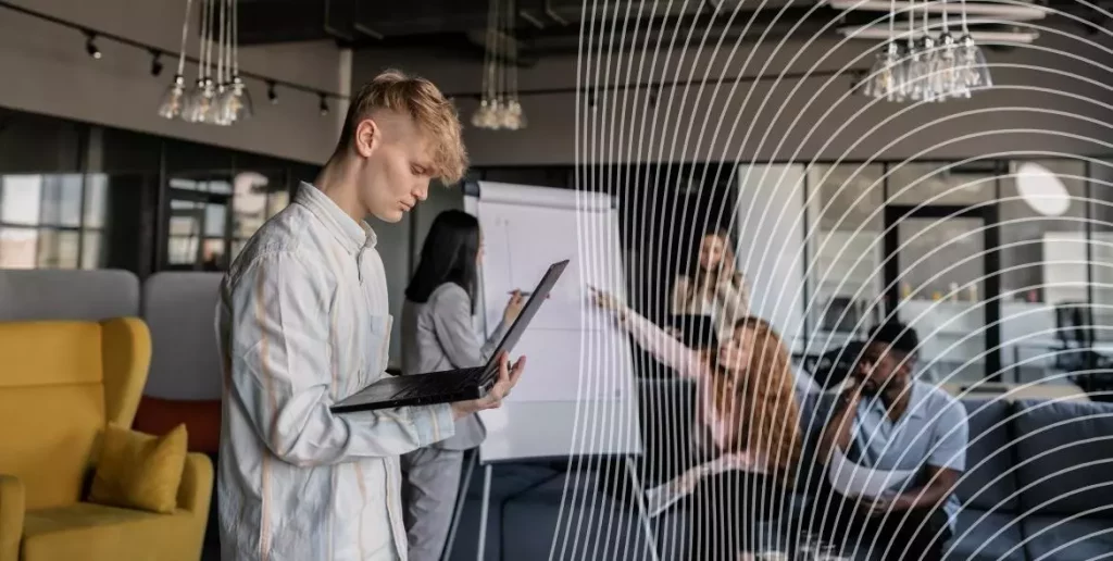 Man on a laptop in an office