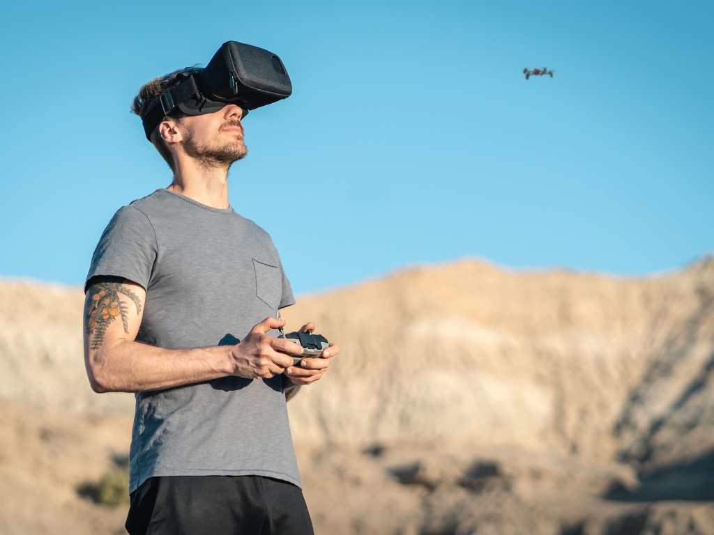 young man-using-drone-outside