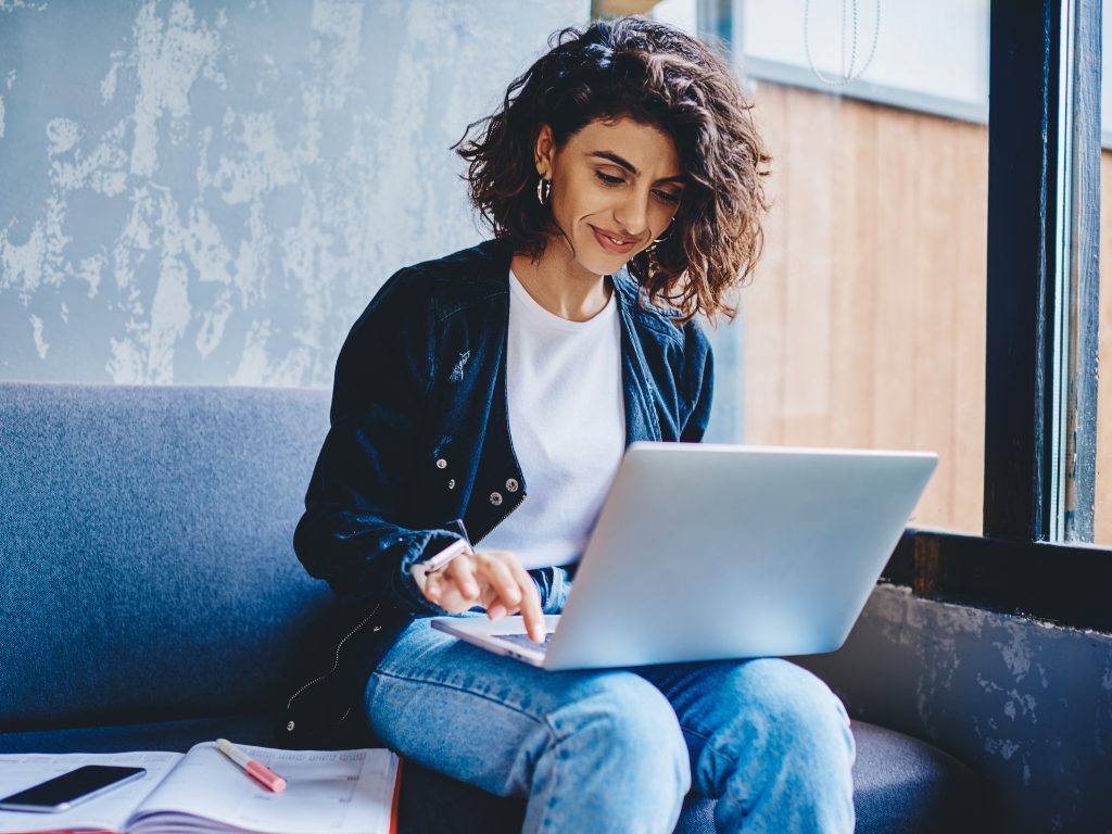 young woman-work-blockchain-project-laptop